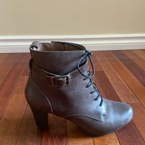 Women’s leather grey bootie with side zipper .  Lace up detail.  Euro Size 38